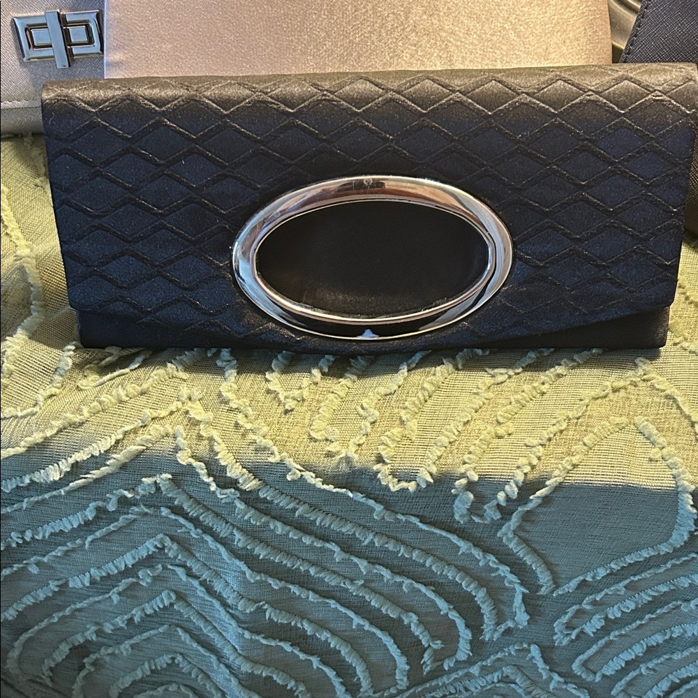 Chic Black Quilted Clutch with Silver Detail